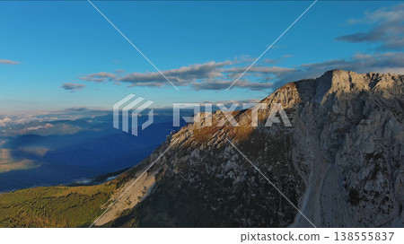 Aerial view of amazing rocky mountains at sunset Aerial view of amazing rocky mountains at sunset 138555837