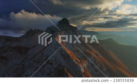 Aerial view of amazing rocky mountains at sunset Aerial view of amazing rocky mountains at sunset 138555839