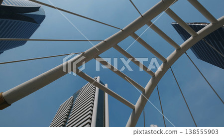 Walkway bridge arch and skyscrapers in Bangkok Walkway bridge arch and skyscrapers in Bangkok 138555903