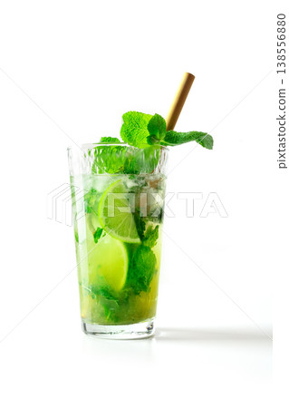 Mojito, summer cocktail with mint, lime, and ice, side view of a single glass Mojito, summer cocktail with mint, lime, and ice, side view of a single glass 138556880
