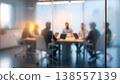 Photo of blurred business meeting in modern office behind glass wall, teamwork and collaboration concept Photo of blurred business meeting in modern office behind glass wall, teamwork and collaboration concept 138557139