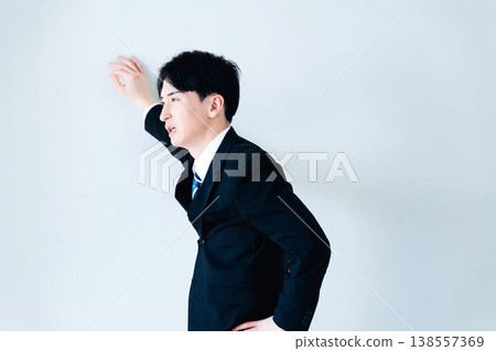 A depressed young businessman A depressed young businessman 138557369