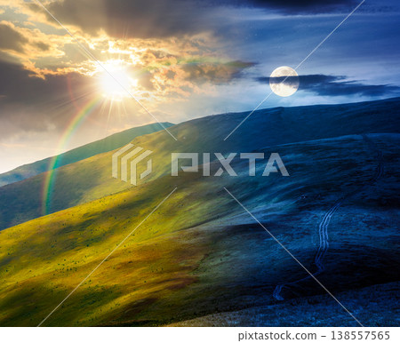 mountain landscape in summer. day and night time change concept. beautiful travel background with rolling hills. lush green grassy hillside with sun and moon dappled light. astrology wallpaper mountain landscape in summer. day and night time change concept. beautiful travel background with rolling hills. lush green grassy hillside with sun and moon dappled light. astrology wallpaper 138557565