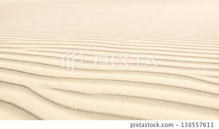 Beige sand texture with ripples for background, minimalist design, or nature concept Beige sand texture with ripples for background, minimalist design, or nature concept 138557611