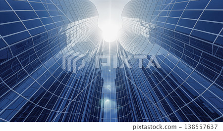 abstract low angle perspective looking up at modern glass steel skyscraper facades reflecting bright blue sky sun shining through buildings 138557637