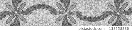 Panoramic repeating pebble mosaic floor with star motifs and waves. Panoramic repeating pebble mosaic floor with star motifs and waves. 138558286