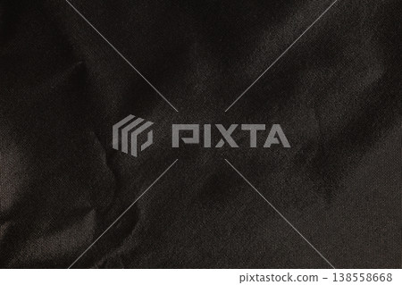 Glossly black crumpled fabric material texture Glossly black crumpled fabric material texture 138558668