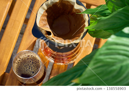Top view of filter coffee in pour over dripper and glass 138558903