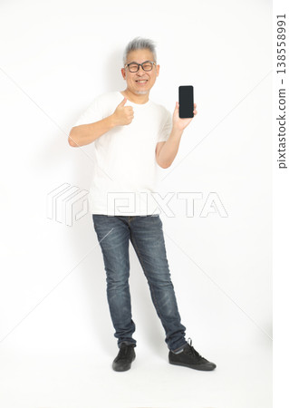 Thumbs Up with Smartphone Thumbs Up with Smartphone 138558991