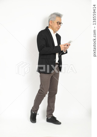 Walking and Using Smartphone Walking and Using Smartphone 138559414