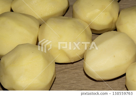 peeled large potatoes ready to be boiled and cooked peeled large potatoes ready to be boiled and cooked 138559763
