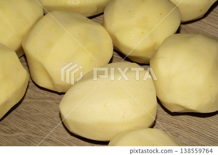 peeled large potatoes ready to be boiled and cooked peeled large potatoes ready to be boiled and cooked 138559764