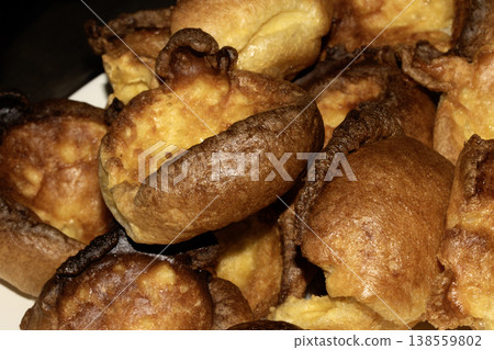 Close up of home make Yorkshire pudding roasted batter for Sunday roast dinner Close up of home make Yorkshire pudding roasted batter for Sunday roast dinner 138559802