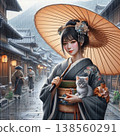 On the cobblestone streets of the ancient capital, shrouded in spring rain, a young woman in a beautiful kimono gently holds a gray kitten beneath a traditional Japanese umbrella. 138560291