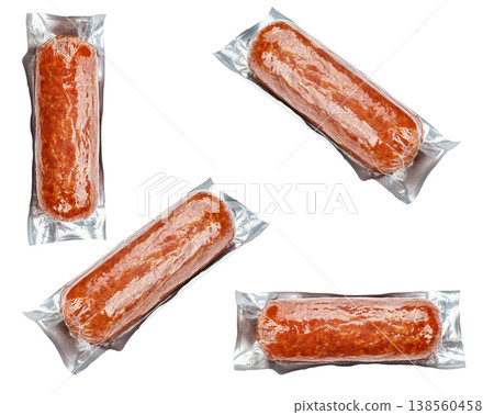 Set of vacuum sealed sausages isolated on white background.  138560458