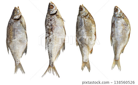 Set of dried fish isolated on white background, traditional salted fish collection Set of dried fish isolated on white background, traditional salted fish collection 138560526