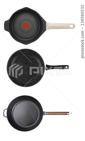 Set of three professional non-stick frying pans isolated on white background Set of three professional non-stick frying pans isolated on white background 138560532