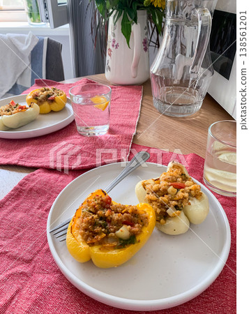 This nutritious dish of stuffed bell peppers with quinoa, lentils, and vegetables makes for a hearty, plant-based meal thats both flavorful and satisfying, perfect for any time of day This nutritious dish of stuffed bell peppers with quinoa, lentils, and vegetables makes for a hearty, plant-based meal thats both flavorful and satisfying, perfect for any time of day 138561201