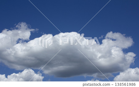 Blue sky with puffy clouds 138561986