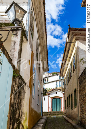 Alley with a church Alley with a church 138562957