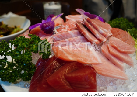 Close up of fresh red tuna akami and marbled otoro sashimi on ice Close up of fresh red tuna akami and marbled otoro sashimi on ice 138564167