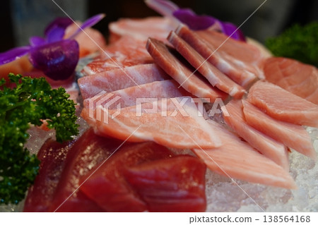 Close up of fresh red tuna akami and marbled otoro sashimi on ice Close up of fresh red tuna akami and marbled otoro sashimi on ice 138564168
