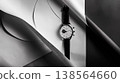 watch is placed on top of three large sheets of paper, with the left side and right sides leaning against each other. the background color should be white to highlight the object 138564660
