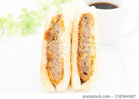 Delicious Menchi-katsu sandwich and coffee Delicious Menchi-katsu sandwich and coffee 138564987