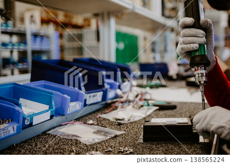 Digital computer PC technology and electronic industry manufacturing and production business concept: macro view of the CPU processor in hand in gloves in the electronic laboratory Digital computer PC technology and electronic industry manufacturing and production business concept: macro view of the CPU processor in hand in gloves in the electronic laboratory 138565224