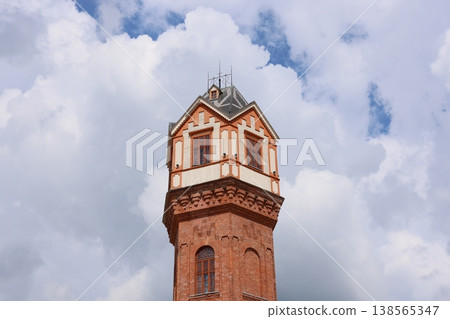 Colorful historic monument. Vivid tower with scenic surroundings Colorful historic monument. Vivid tower with scenic surroundings 138565347
