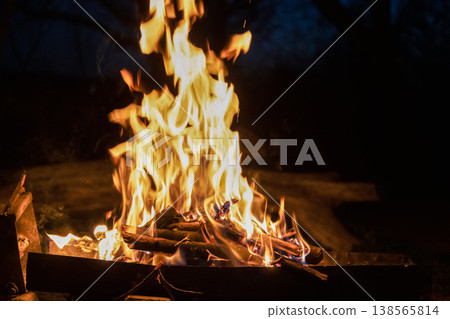 Bright fire from the fire at night Bright fire from the fire at night 138565814