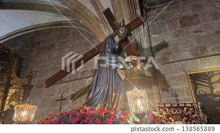 Detailed religious statue of jesus carrying a cross inside church for semana santa holy week procession poster and banner design Detailed religious statue of jesus carrying a cross inside church for semana santa holy week procession poster and banner design 138565889