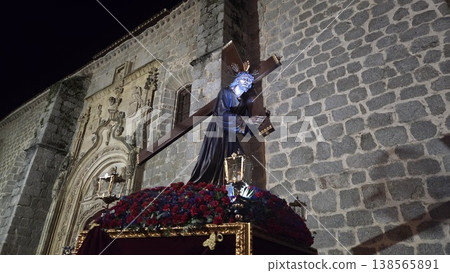Procession statue of jesus carrying a cross at night during semana santa in spain for religious parade background and banner design 138565891