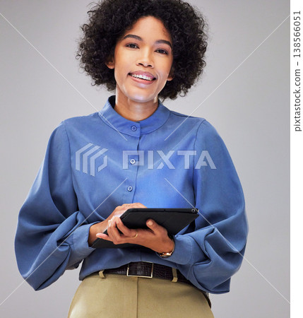 Happy, portrait and business woman with tablet in studio for internet, search or planning on grey background. African, web and face of female entrepreneur with app for sign up, email or subscription 138566051