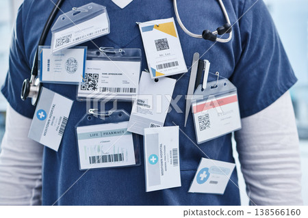 Close up, doctor and name tag with stethoscope, career and medical hospital. Healthcare, service professional and work for wellness, scrubs and worker for employee, surgeon and medicare practitioner Close up, doctor and name tag with stethoscope, career and medical hospital. Healthcare, service professional and work for wellness, scrubs and worker for employee, surgeon and medicare practitioner 138566160