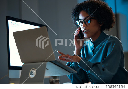 Laptop, phone call communication and business woman consulting, speaking and monitor data, web sales or metrics. Mobile smartphone, conversation and night person review, news and email in office 138566164