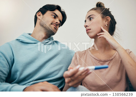 Couple, pregnancy test and stress in home for infertility, anxiety or support. Woman, or male person or frustrated ovulation news or waiting information fear for loss, relationship problem or comfort 138566239