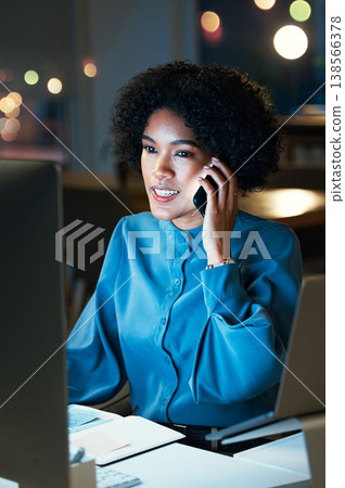 Woman at desk, phone call and computer for schedule, agenda and reminder for admin at night. Communication, smartphone and girl planning productivity for time management in dark office at startup. Woman at desk, phone call and computer for schedule, agenda and reminder for admin at night. Communication, smartphone and girl planning productivity for time management in dark office at startup. 138566378