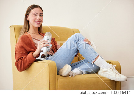 Woman in portrait, mic and podcast, influencer and media with broadcast, platform and communication. Talk show, chat and live streaming with presenter or speaker, interview with wall background Woman in portrait, mic and podcast, influencer and media with broadcast, platform and communication. Talk show, chat and live streaming with presenter or speaker, interview with wall background 138566415