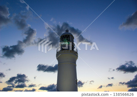 Evening view of Omaezaki Lighthouse with its lights lit up in the twilight (Omaezaki City, Shizuoka Prefecture) 138566626