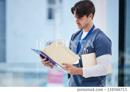 Hospital folder, doctor and man reading documents, healthcare records or clinic information. Wellness services, medical research and professional nurse, surgeon or expert check paperwork portfolio Hospital folder, doctor and man reading documents, healthcare records or clinic information. Wellness services, medical research and professional nurse, surgeon or expert check paperwork portfolio 138566713