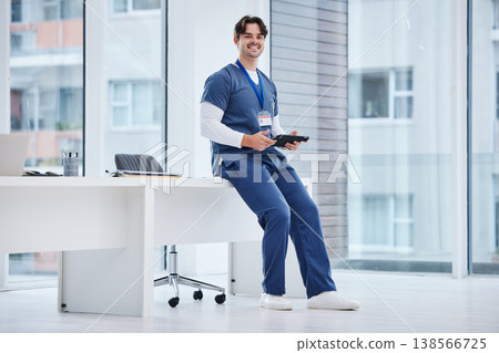 Hospital portrait, tablet and happy man, doctor or relax nurse research, typing or search medical database, info or data. Online medicine stats, healthcare clinic and surgeon sitting on office desk Hospital portrait, tablet and happy man, doctor or relax nurse research, typing or search medical database, info or data. Online medicine stats, healthcare clinic and surgeon sitting on office desk 138566725