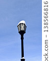 city street lamp on the background of the blue sky in winter 138566816