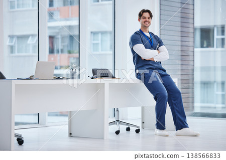 Portrait, arms crossed and relax happy man, doctor or nurse with confidence, career pride and expert medical service. Wellness support, medicine clinic and professional surgeon sitting on office desk Portrait, arms crossed and relax happy man, doctor or nurse with confidence, career pride and expert medical service. Wellness support, medicine clinic and professional surgeon sitting on office desk 138566833