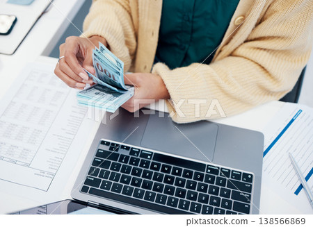 Hands, laptop and a business person counting money closeup in the office of a bank for accounting. Cash, budget and trading with a financial advisor in the workplace for investment growth from above Hands, laptop and a business person counting money closeup in the office of a bank for accounting. Cash, budget and trading with a financial advisor in the workplace for investment growth from above 138566869
