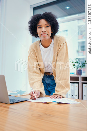 Portrait of woman, notes and standing in office with admin, internet and creative ideas for freelance project. Remote work, writing on paperwork and girl at desk with research, agenda and happy face. Portrait of woman, notes and standing in office with admin, internet and creative ideas for freelance project. Remote work, writing on paperwork and girl at desk with research, agenda and happy face. 138567128