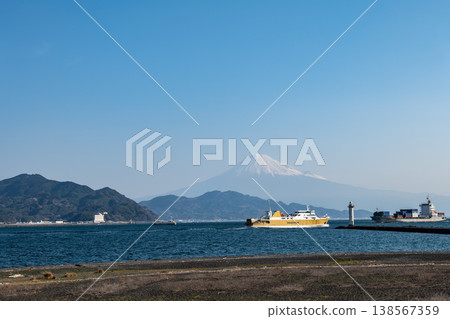 The Suruga Bay Ferry "Fuji" departing from Shimizu Port, with snow-covered Mount Fuji in the background. The Suruga Bay Ferry "Fuji" departing from Shimizu Port, with snow-covered Mount Fuji in the background. 138567359