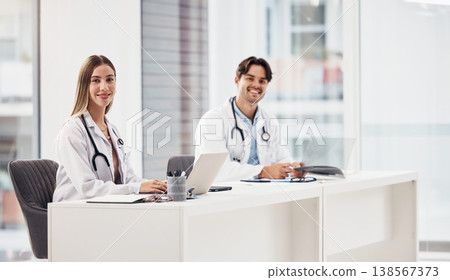 Portrait, laptop and healthcare with a team of doctors in the hospital for medical collaboration you can trust. Smile, computer or teamwork with a woman and man medicine professional in a clinic Portrait, laptop and healthcare with a team of doctors in the hospital for medical collaboration you can trust. Smile, computer or teamwork with a woman and man medicine professional in a clinic 138567373