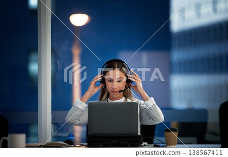 Business woman, call center and headphones at night for communication, ready for telemarketing and sales in office. Professional agent, consultant or worker start job, telecom or ecommerce on laptop Business woman, call center and headphones at night for communication, ready for telemarketing and sales in office. Professional agent, consultant or worker start job, telecom or ecommerce on laptop 138567411
