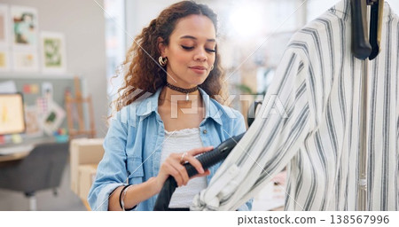 Ecommerce, fashion and woman steam clothes in workshop for order, delivery and distribution startup. Small business, online shopping and designer with heat for clothing for cargo, shipping or package 138567996